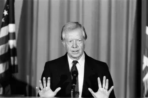 00910 Prints: Former President Jimmy Carter talks to the press at the American Embassy on overseas