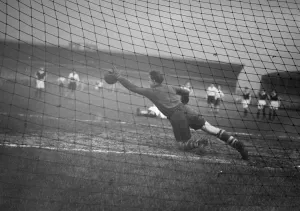 Goal Keeper Prints: Preston North End v Burnley Division One Desmond Thompson Burnley goalkeeper dives in