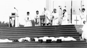 Priests to be ordained prostrate themselves before Pope John Paul II at Heaton Park