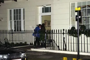 00197 Prints: Former Prime Minister Baroness Thatcher with her husband Denis arrives at her four-storey