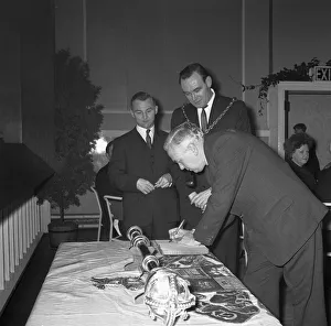 01071 Prints: Prime Minister Harold Wilson (1916 - 1995) signing the visitors book at the Jarrow Civic