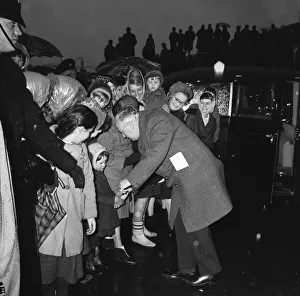 01071 Prints: Prime Minister Harold Wilson (1916 - 1995) speaks to a young member of the crowd whilst
