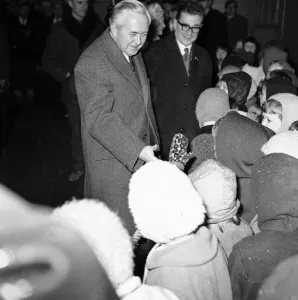 01071 Prints: Prime Minister Harold Wilson (1916 - 1995) speaks to a young member of the crowd whilst
