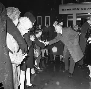 01071 Prints: Prime Minister Harold Wilson (1916 - 1995) speaks to a young member of the crowd whilst