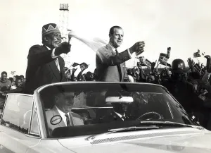 01299 Prints: The Prime minister of Kenya, Jomo Kenyatta drives through a crowd of people while
