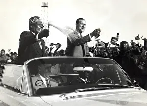 01440 Prints: The Prime Minister of Kenya, Jomo Kenyatta drives through a crowd of people while