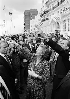 Prime Minister Margaret Thatcher and Conservative Chairman Norman Tebbit return to