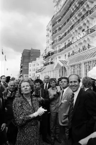 Prime Minister Margaret Thatcher and Conservative Chairman Norman Tebbit return to