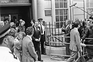 Prime Minister Margaret Thatcher and husband Denis emerge from Conservative Party