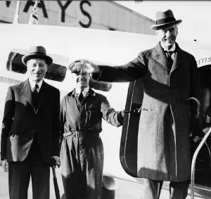 Prime Ministers Prints: Prime Minister Neville Chamberlain steps off a plane wearing an overcoat and a hat
