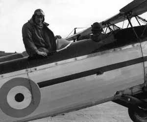 Prime Minister Ramsay MacDonald seen here climbing aboard a Fairey 3F aircraft of number