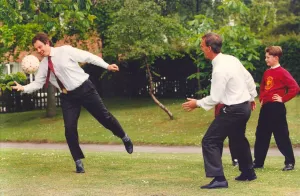 Ball Prints: Prime Minister Tony Blair and ex FIFA football referee George Courtney play football