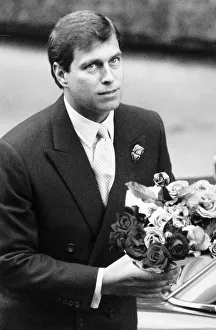 Bouquet Prints: Prince Andrew with bunch of flowers for wife and baby in hospital August 1988