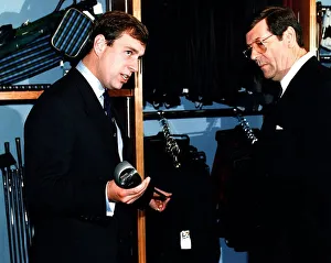 Prince Andrew after opening new clubhouse Turnberry looking at golf club with Bob