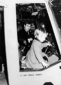 Prince Andrew with Prince William onboard HMS Brazen on the River Thames near London