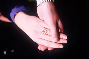 00127 Prints: Prince Andrew and Sarah Ferguson annnounce their engagement showing ring Marc 1986
