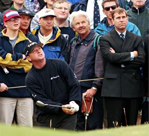 Bunker Prints: Prince Andrew watches Ian Woosham play out of a bunker during the third round of the Open
