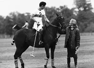 Prince Charles apologising to girlfriend Jane Ward at a polo match after nearly hitting