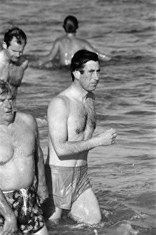 Coast Prints: Prince Charles enjoying some time at the beach during his visit to Australia. March 1979