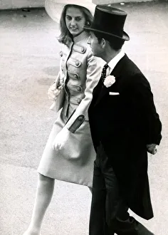 Prince Charles escorts an unidentified lady at Ascot day three Prince Charles