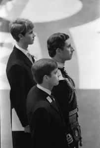 00191 Prints: Prince Charles, flanked by his brothers Edward and Andrew waits patiently in front of