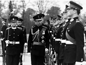 00127 Prints: Prince Charles inspects a guard of honour at Sandhurst in uniform December 1978