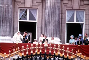 Prince Charles kisses Dianas hand at Buckingham Palace following their wedding