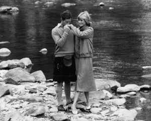 Kilts Prints: Prince Charles kissing the hand of Princess Diana while on Honeymoon at Balmoral Scotland