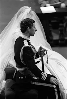 00200 Prints: Prince Charles and Lady Diana sit at the altar in St Pauls Cathedral during their royal