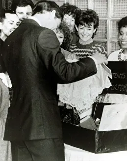 Knickers Prints: Prince Charles with large pair of frilly French knickers at the North Kensington