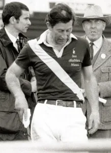 00199 Prints: Prince Charles mopping his brow with hankie during a tough Polo match - showing bald