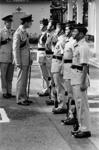Inspecting Prints: Prince Charles Nepal, dressed in his Colonel-in-Chief uniform. Nepal. December 1980