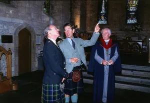 00185 Prints: Prince Charles Prince of Wales October 1989 pointing to the roof in a church in Dundee