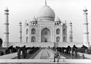 00382 Prints: Prince Charles, the Prince of Wales, sitting in front of the Taj Mahal during his visit