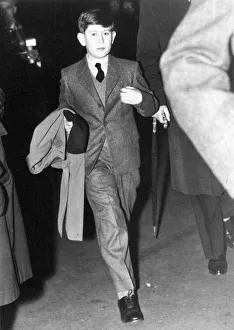 Prince Charles - The Prince of Wales wearing long trousers is seen walking down