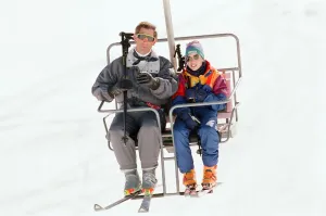 Prince Charles and Prince William pictured on a ski chair lift during a skiing holiday in
