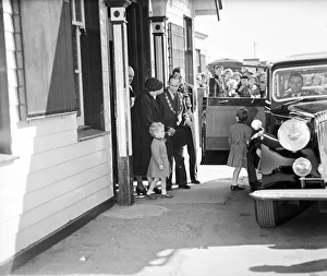Prince Charles and Princess Anne arrive at Ballater Station, met by Provost J P Craig