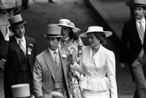 Prince Charles and Princess Diana with Oliver Hoare and his wife Diane behind at Royal