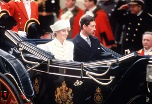 Prince Charles and Princess Diana in an open carriage during the state visit of King Fahd