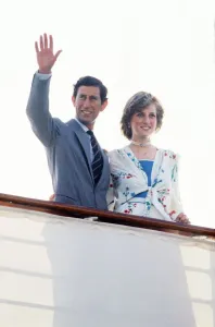 Standing Prints: Prince Charles and Princess Diana standing together on board the Royal yacht Britannia in