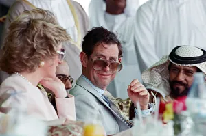 Prince Charles and Princess Diana visit a camel race at Al Maqam