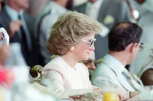 Prince Charles and Princess Diana visit a camel race at Al Maqam