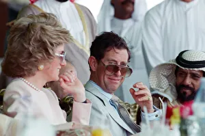 Prince Charles and Princess Diana visit a camel race at Al Maqam