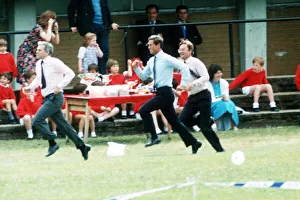 Prince Charles running in the Sports Day Dads Race at the school of Prince William