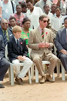 Overseas Prints: Prince Charles and his son Prince Harry visit the village of Dukuduku in South Africa