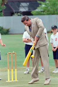 New Zealand Prints: Prince Charles tries his hand at cricket during a visit to Fendalton Primary School