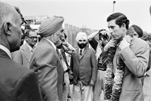 Prince Charles wearing a garland upon his arrival at Amritsar Airport. 28th November 1980