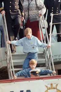 Canada Prints: Prince Harry and his brother Prince William (behind) during their tour of Canada
