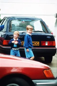 00202 Prints: Prince Harry returns to school at Chepstow Villas Notting Hill Gate with brother Prince