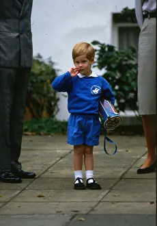 Prince Harry September 1987 wearing a blue sweatshirt shorts with thamas the tank engine